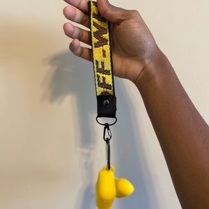 short off-white keychain w/ Air-pod case